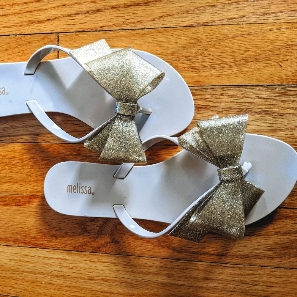 Fun Melissa Gold Sparkle Flip Flops.